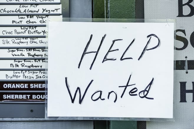 Laminated handwritten "Help Wanted" sign in window of ice cream and yogurt shop in tourist town.jpeg