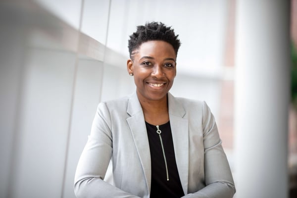 woman-wearing-gray-notch-lapel-suit-jacket