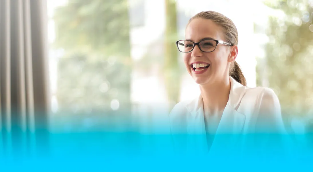 woman-laughing-smiling-at-work